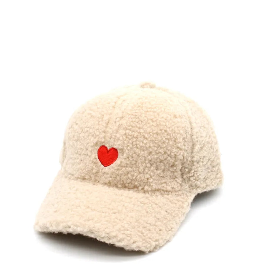 Beige sherpa-lined cap with a red heart