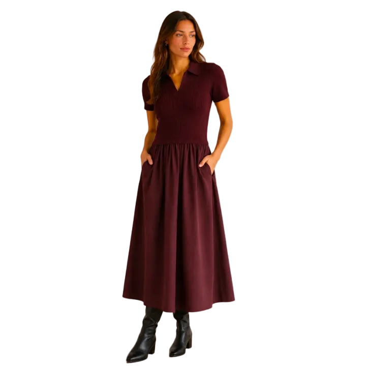 Model wearing KIDDING burgundy short-sleeve ribbed polo midi dress with gathered skirt and side pockets, paired with black leather boots