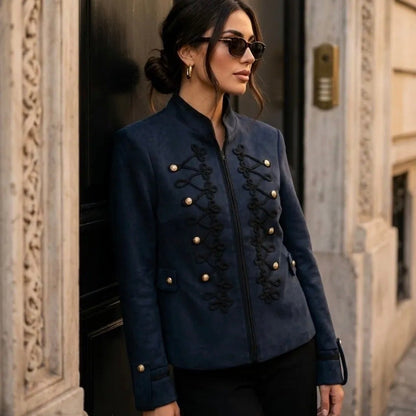 Model wearing KIDDING marine military jacket with black braided scroll frogging, gold dome buttons