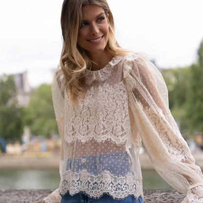 Model wearing KIDDING off white sheer plumeti mesh blouse with scalloped eyelash lace overlays and high collar"